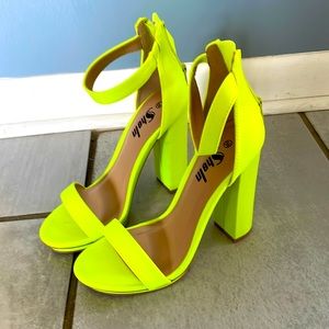 Brand new, never worn, still in the original box. Neon green heels from Shein.